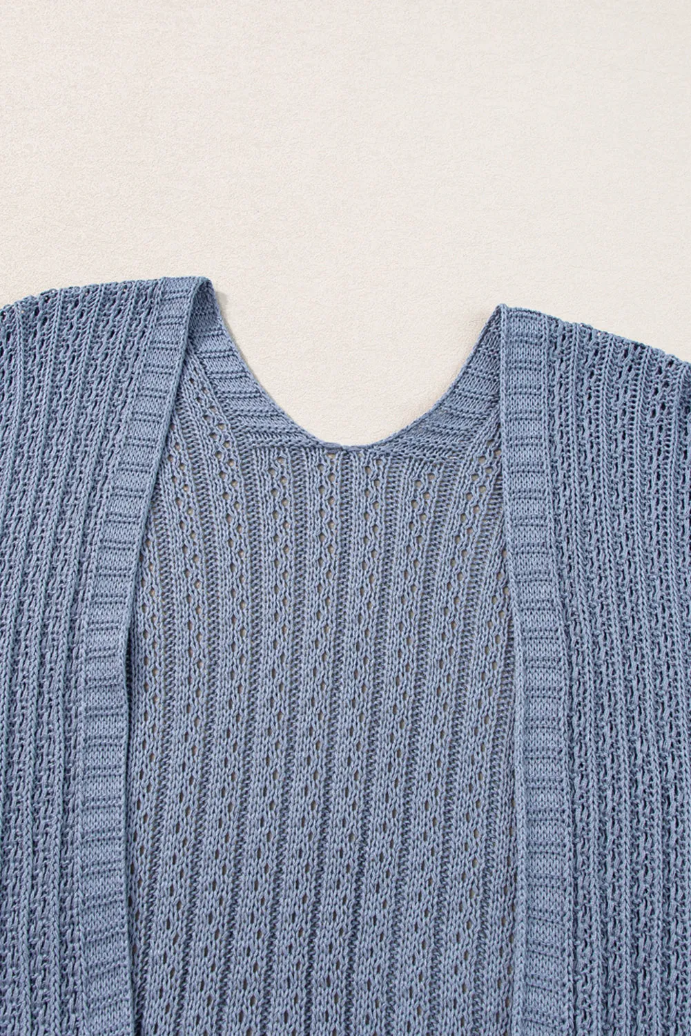 Cardigan en tricot à manches bracelet ajourées bleu ciel