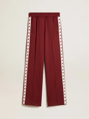 Pantalon de jogging bordeaux pour femme avec étoiles sur les côtés | Golden Goose